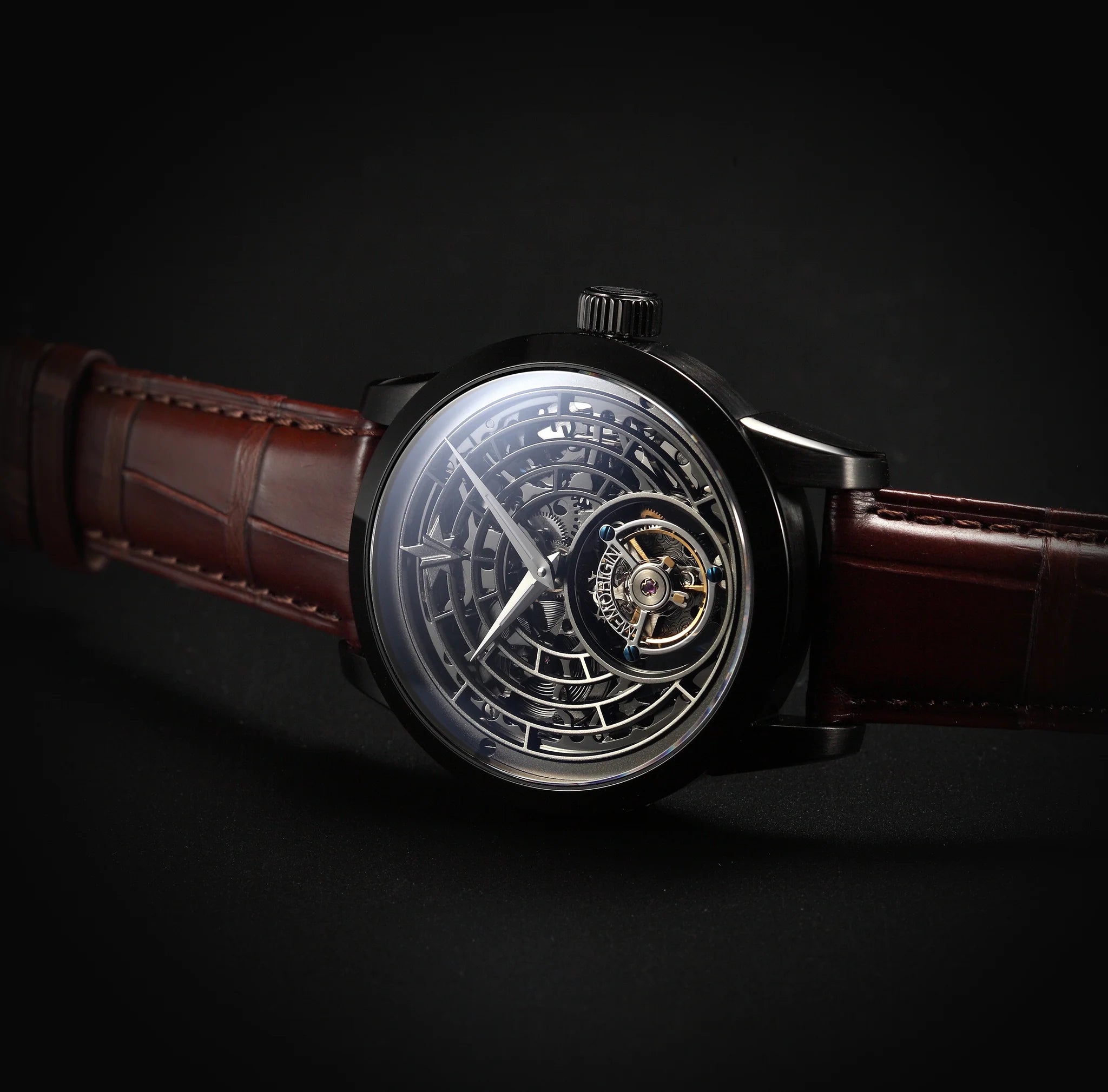 Luxury watch with a brown leather strap on a black background