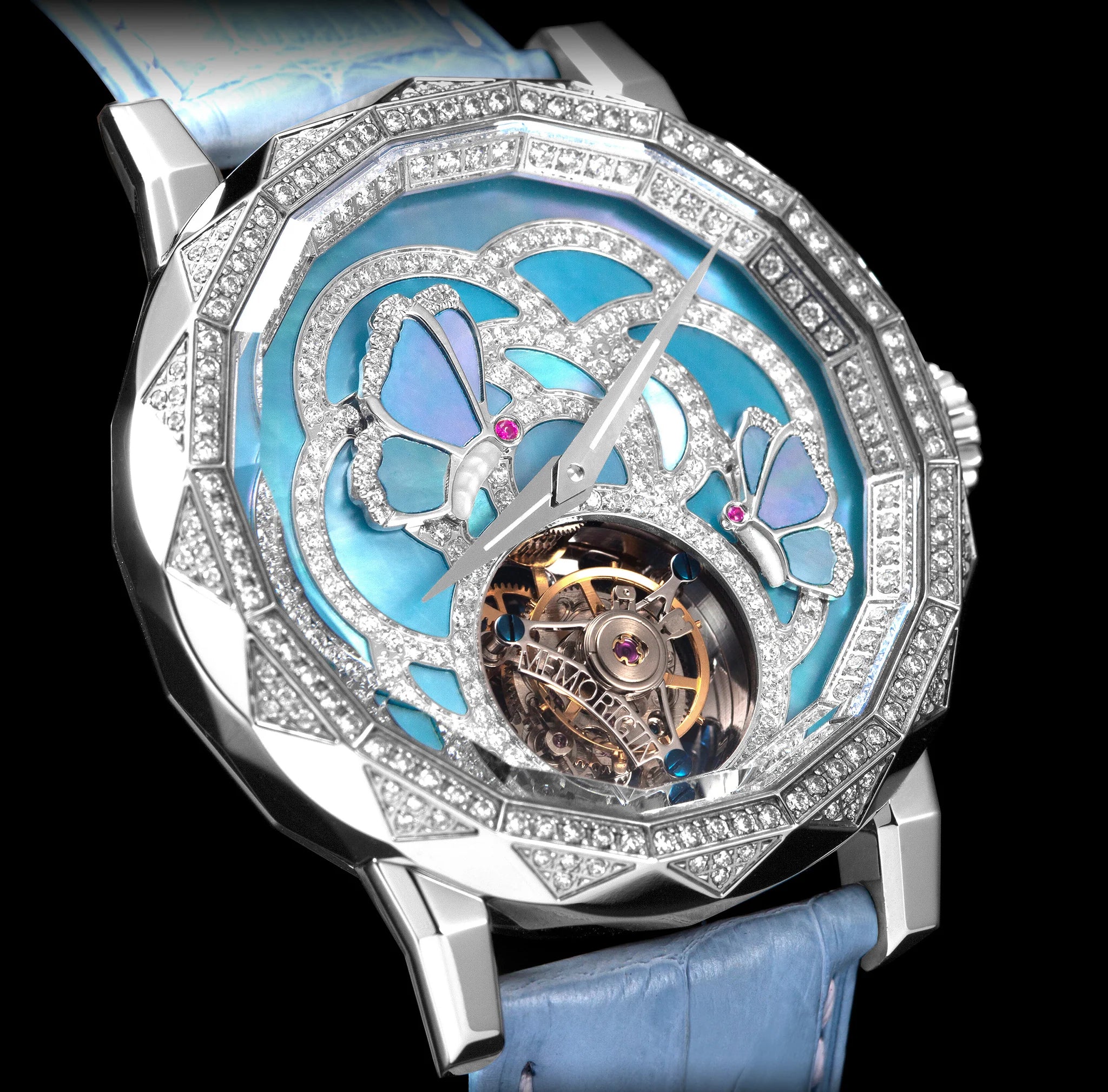 Luxury watch with butterfly design and blue strap on a black background
