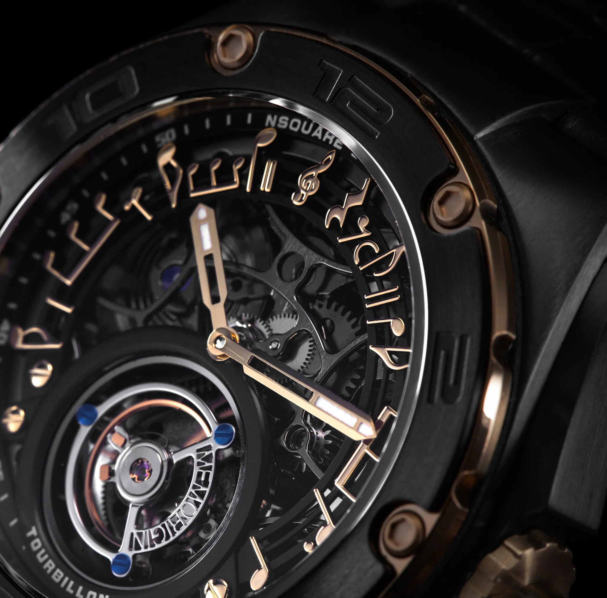 Close-up of a luxury Tourbillon watch with intricate design and visible brand name.
