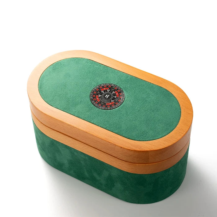 Green and wooden box with a roulette wheel design on a white background