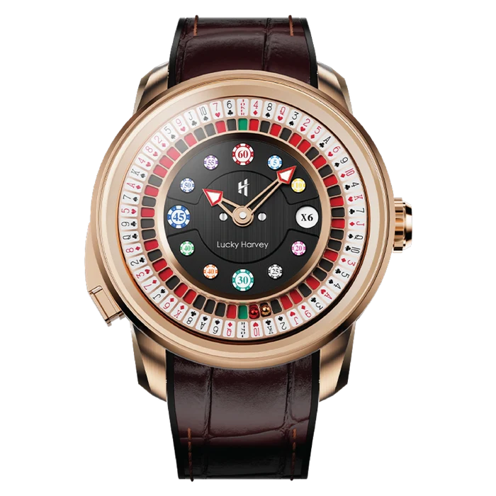 A luxury watch with a rose gold case, dark brown leather strap, and a unique roulette-style dial featuring playing card suits and colorful indicators on a white background.