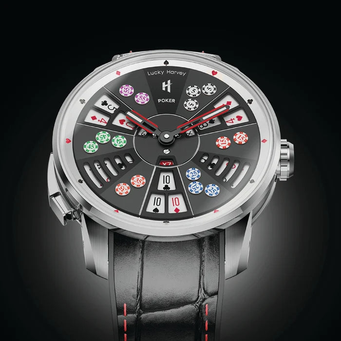 Luxury watch with poker-themed face on a dark background