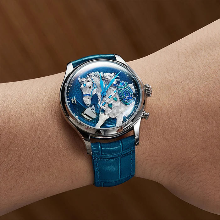 Luxury watch with intricate design on a wrist against a brown background