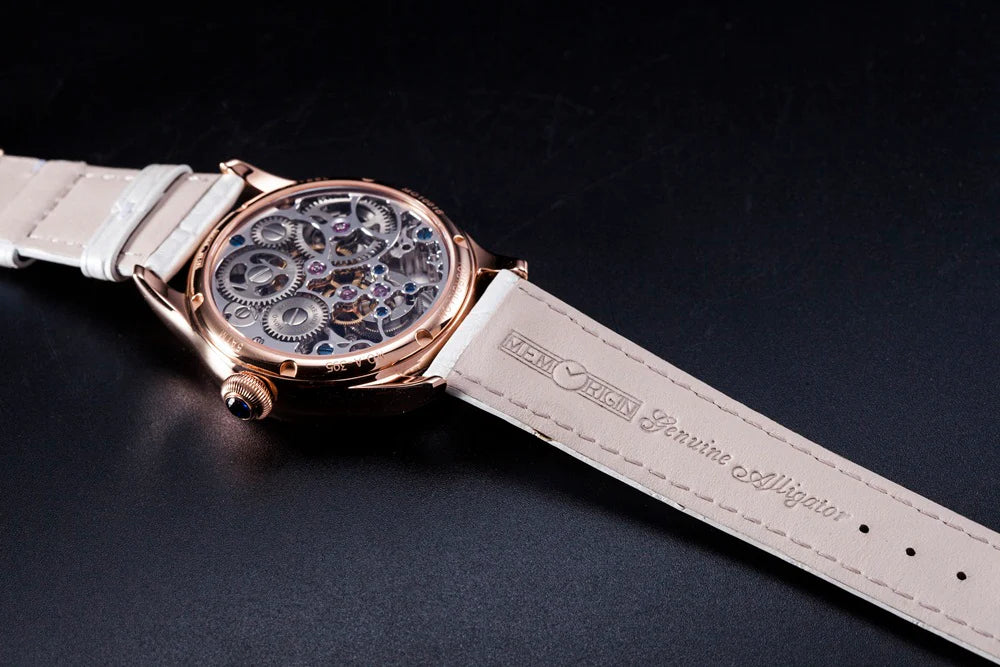 Watch with a visible mechanical movement on a dark background
