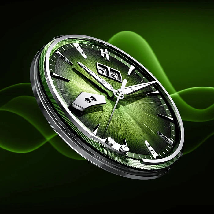 A close-up of a round wristwatch with a dark green sunburst dial, silver-tone case, and green glowing abstract background.