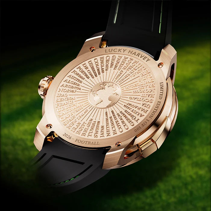 Luxury watch with engraved details on a green background