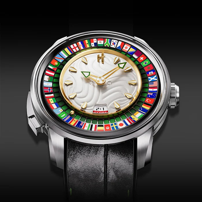 A luxury watch with a round silver-tone case, a white textured dial, gold-tone hands and markers, and a colorful outer ring featuring numerous national flags. It is fitted with a black leather strap and photographed against a dark gradient background.