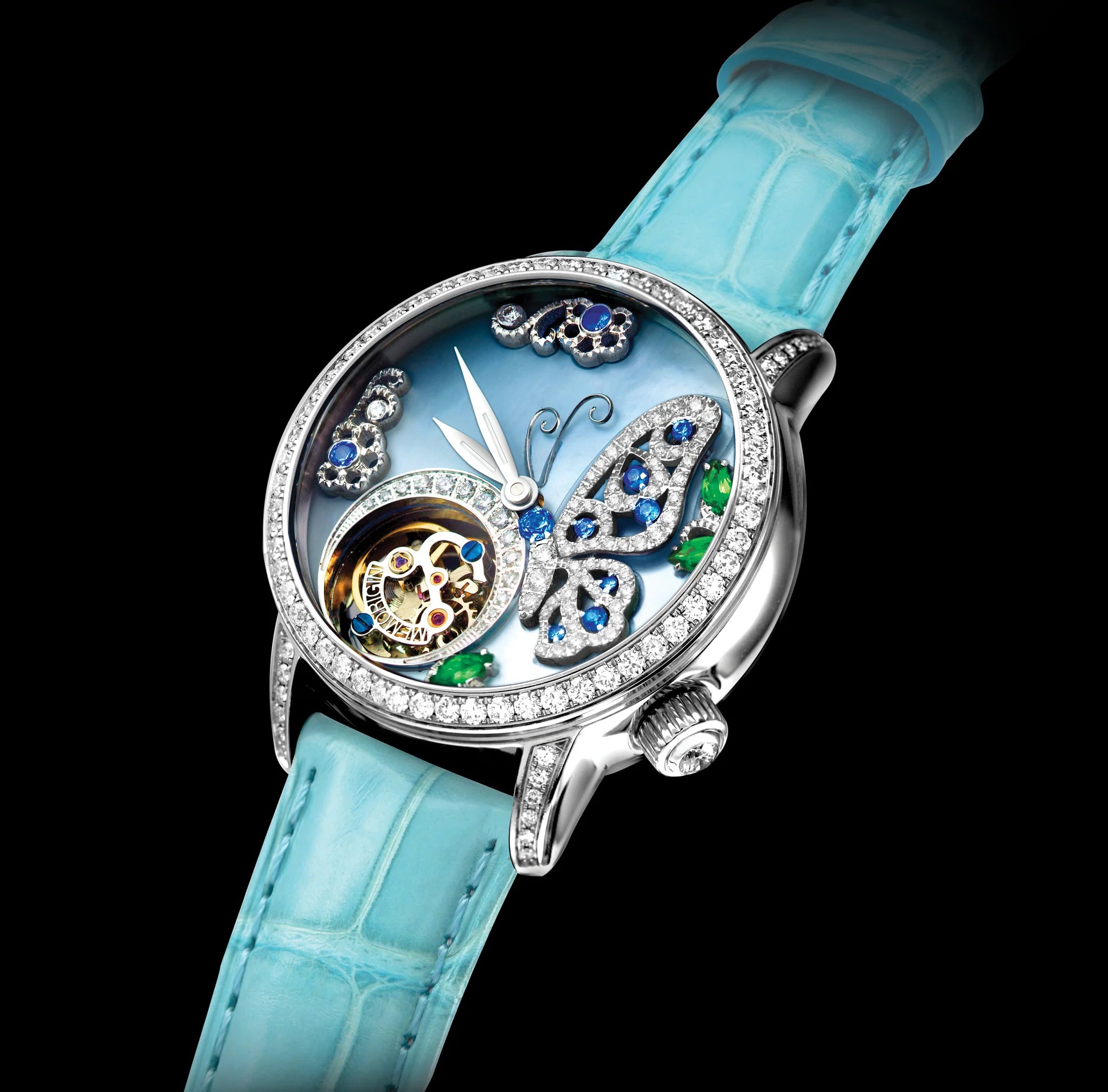 Luxury watch with butterfly design and turquoise strap on black background