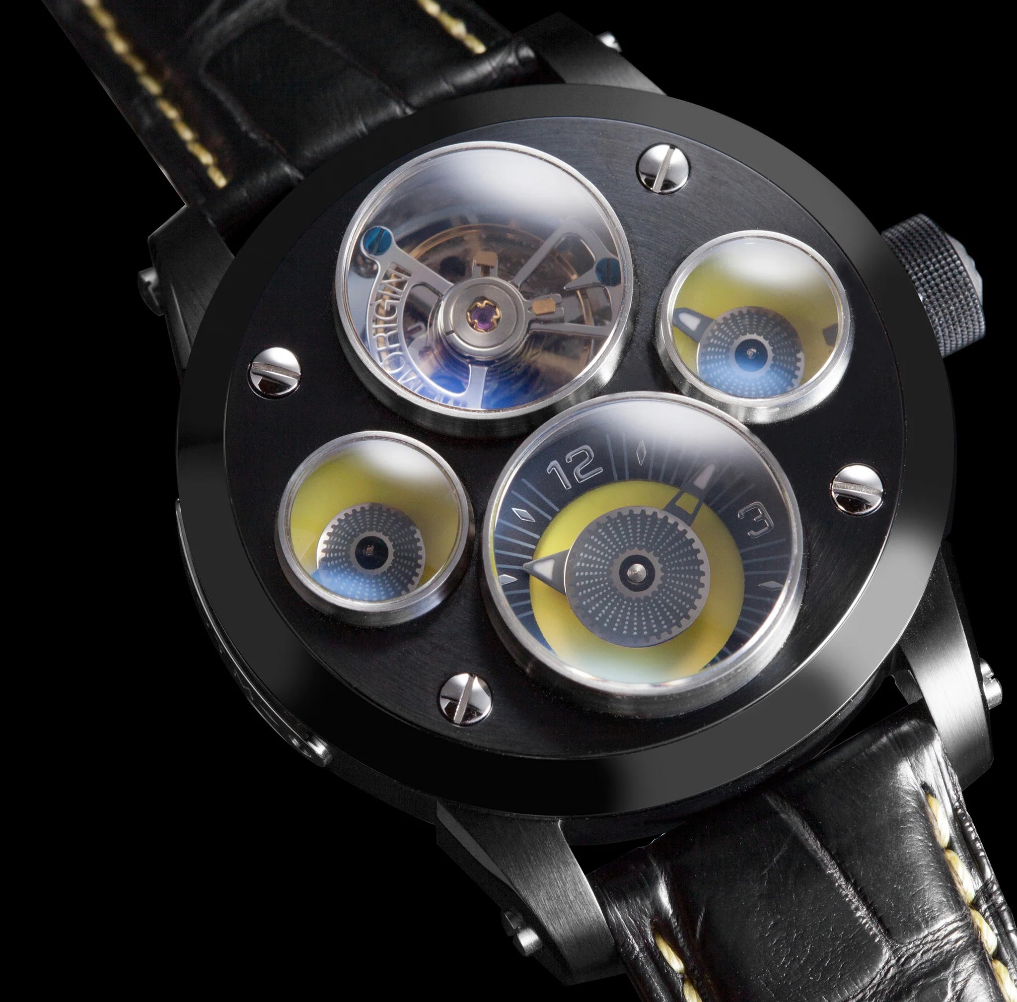 Close-up of a mechanical watch with a black leather strap on a dark background