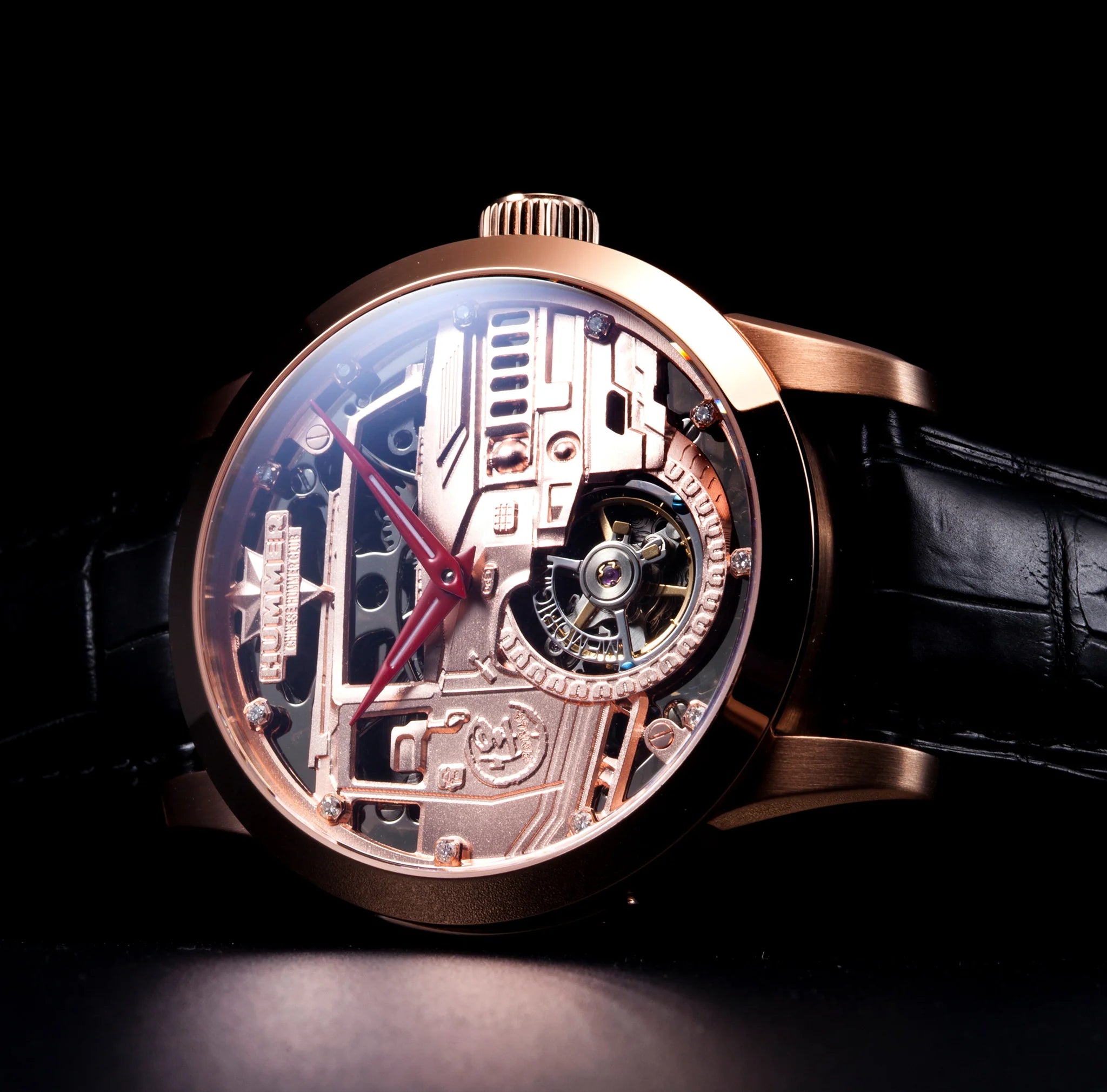Luxury watch with intricate mechanical design on a black background