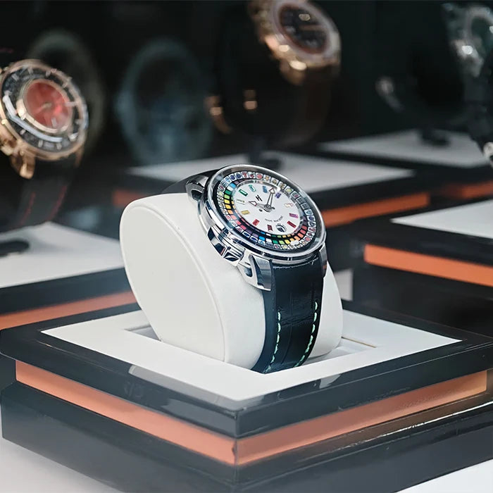Luxury watch on a display stand with blurred background