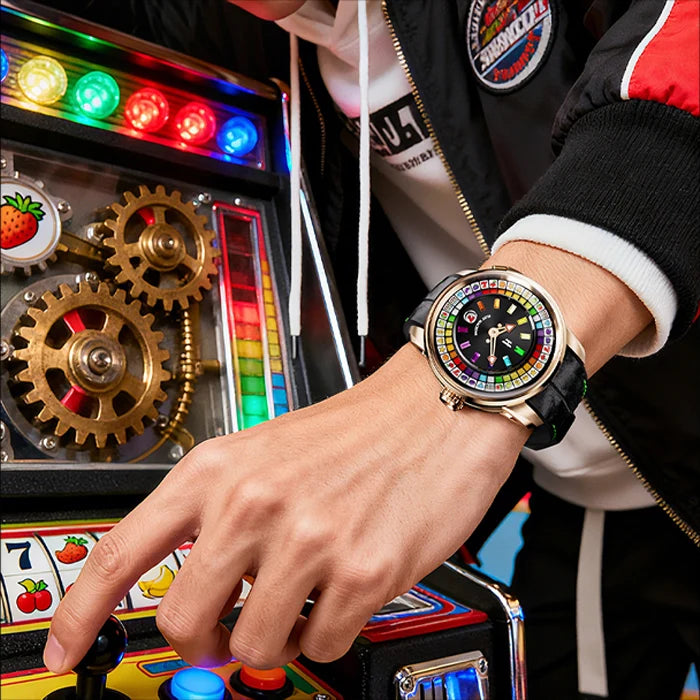 Person playing a vintage-style arcade game with a colorful watch on wrist