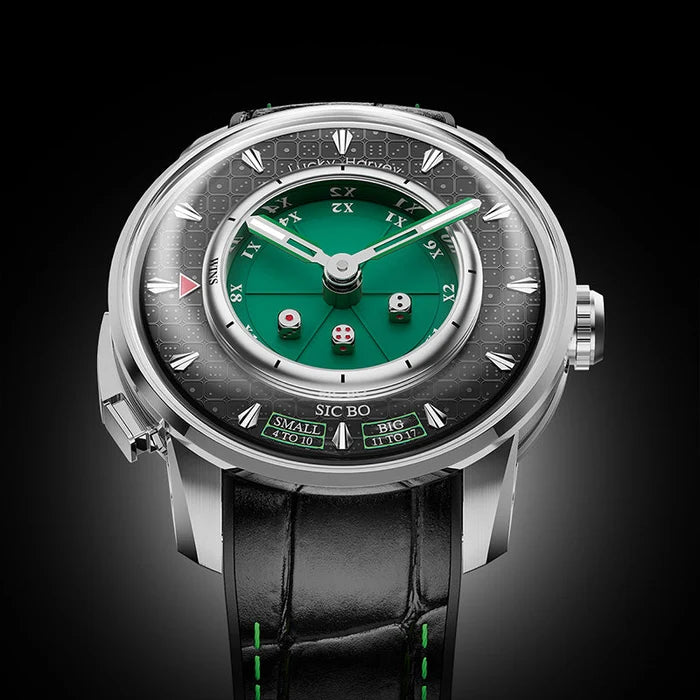 A luxury wristwatch with a silver-toned stainless steel case, a dark gray patterned dial, a vibrant green inner dial, and a black leather strap with green stitching, shown against a dark gradient background.