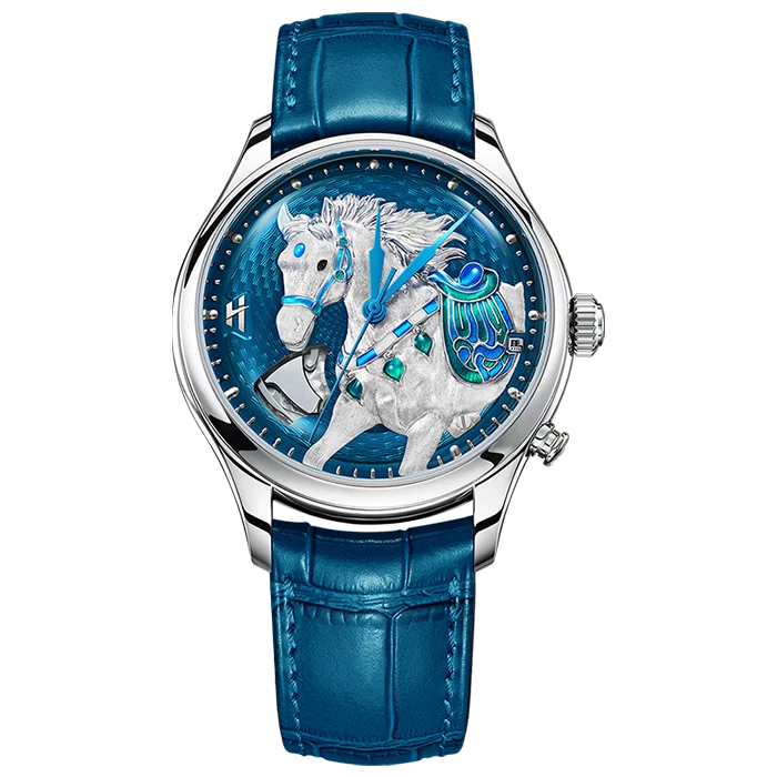 Luxury watch with blue leather strap and intricate design on the face against a white background
