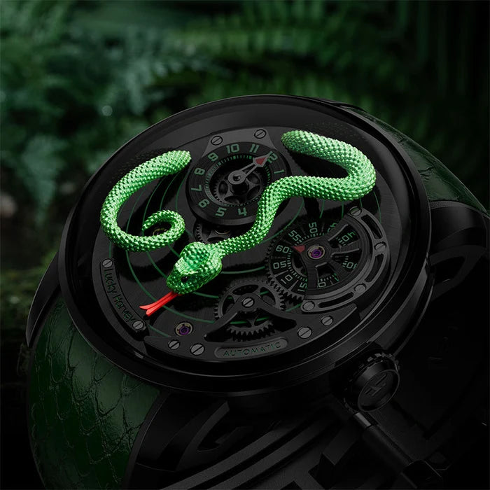 Luxury watch with a green snake decoration on a dark background