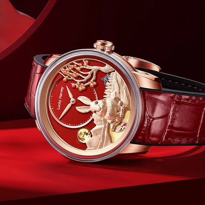 Luxury watch with red face and intricate design on a red background