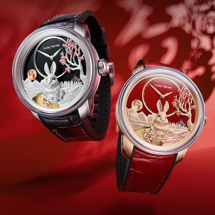 Two watches with intricate designs on a red background
