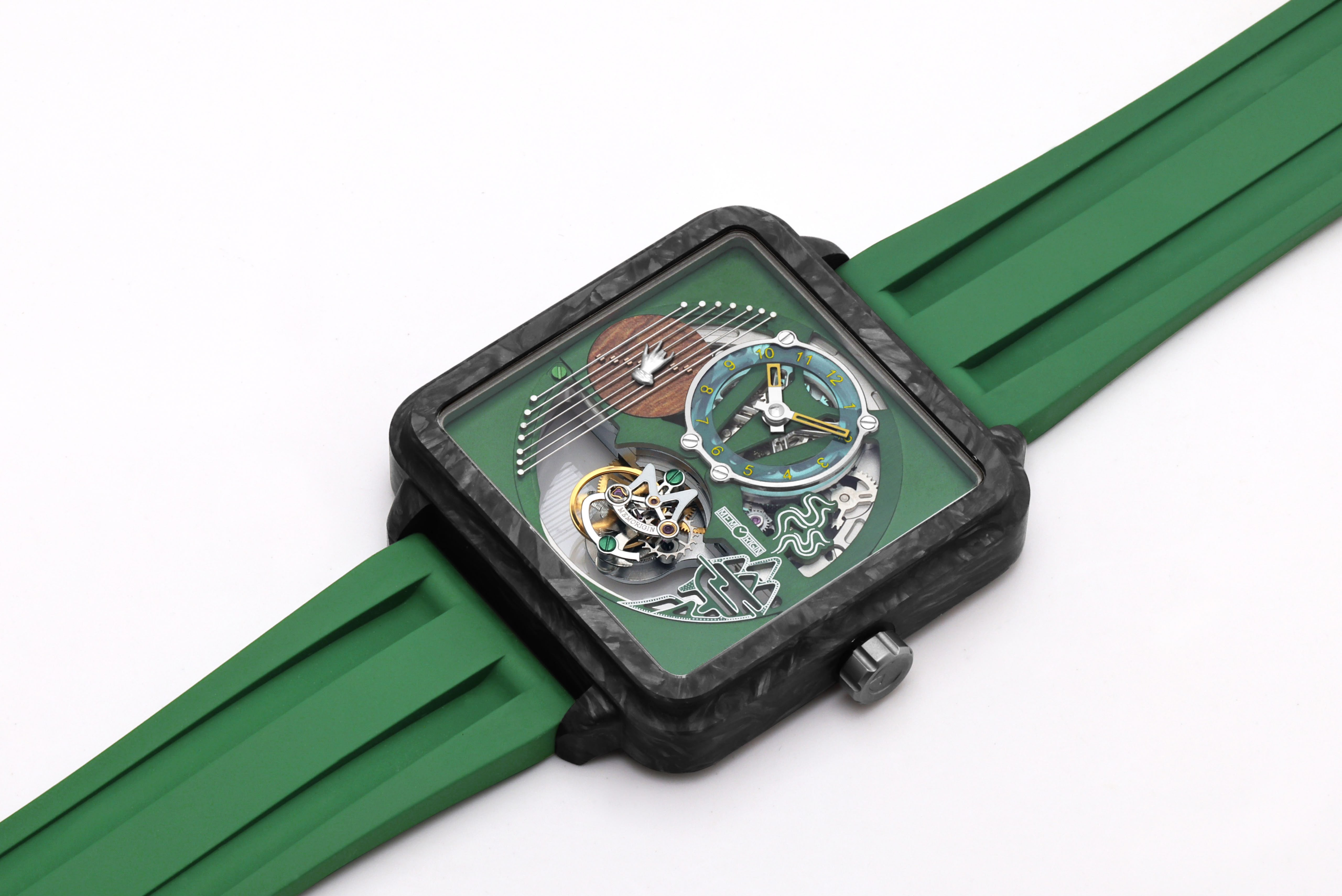 A square skeleton tourbillon watch from memorigin with a green silicone strap and a black carbon-fiber-look case, showing intricate internal mechanical gears through the face on a white background.
