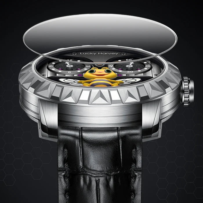 A luxury wristwatch with a silver stainless steel case, a black leather strap, and a transparent glass cover partially lifted to reveal a detailed dial. The dial features a yellow cartoon duck character with a black and yellow striped beak, set against a dark background with subtle hexagonal patterns.