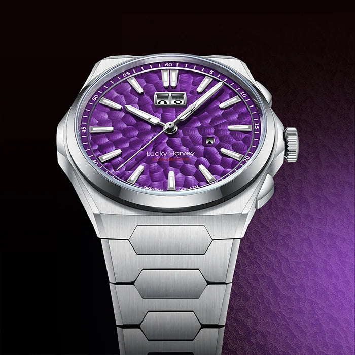 Silver watch with a purple face on a dark background