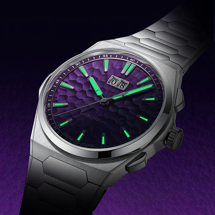 Watch with a purple face and green accents on a dark background