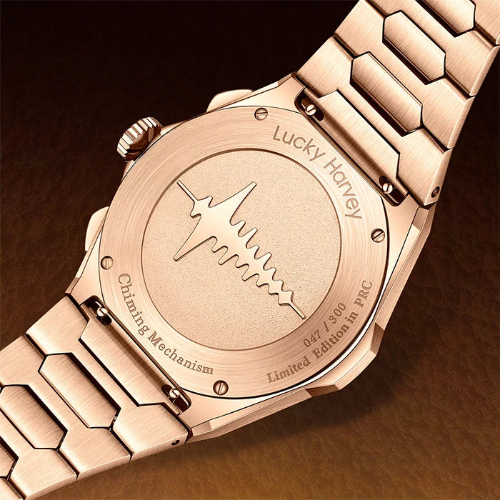Rose gold watch with engraved details on a dark background