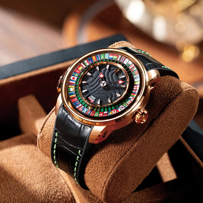 Luxury watch with a colorful face and black leather strap on a brown cushion