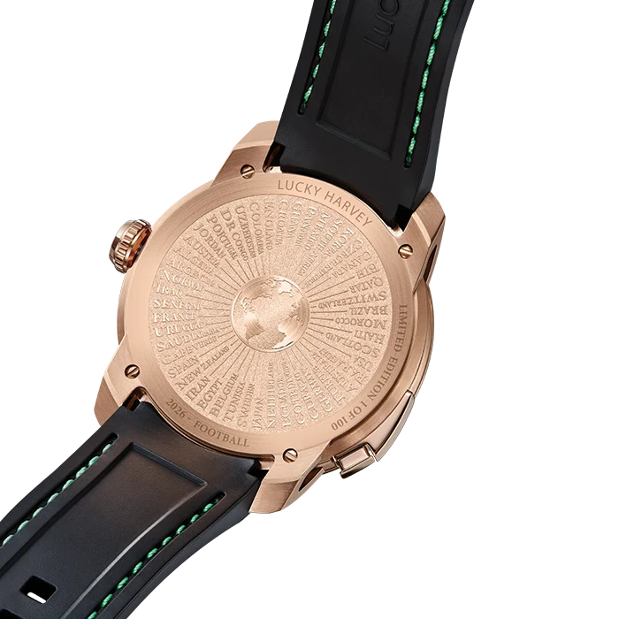 Close-up of the back of a Lucky Harley watch with a rose gold case and a black rubber strap featuring bright green stitching, on a white background.
